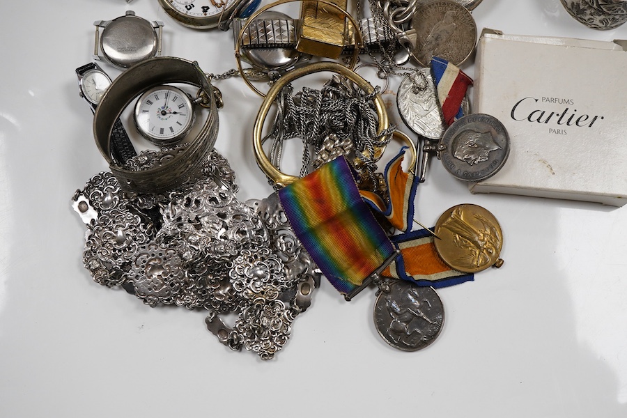 A quantity of assorted collectables, including a boxed Cartier handbag mirror, WWI medals, a plated belt, a Scottish silver and hardstone brooch, a silver hinged bangle, assorted costume jewellery, 925 bracelets, silver